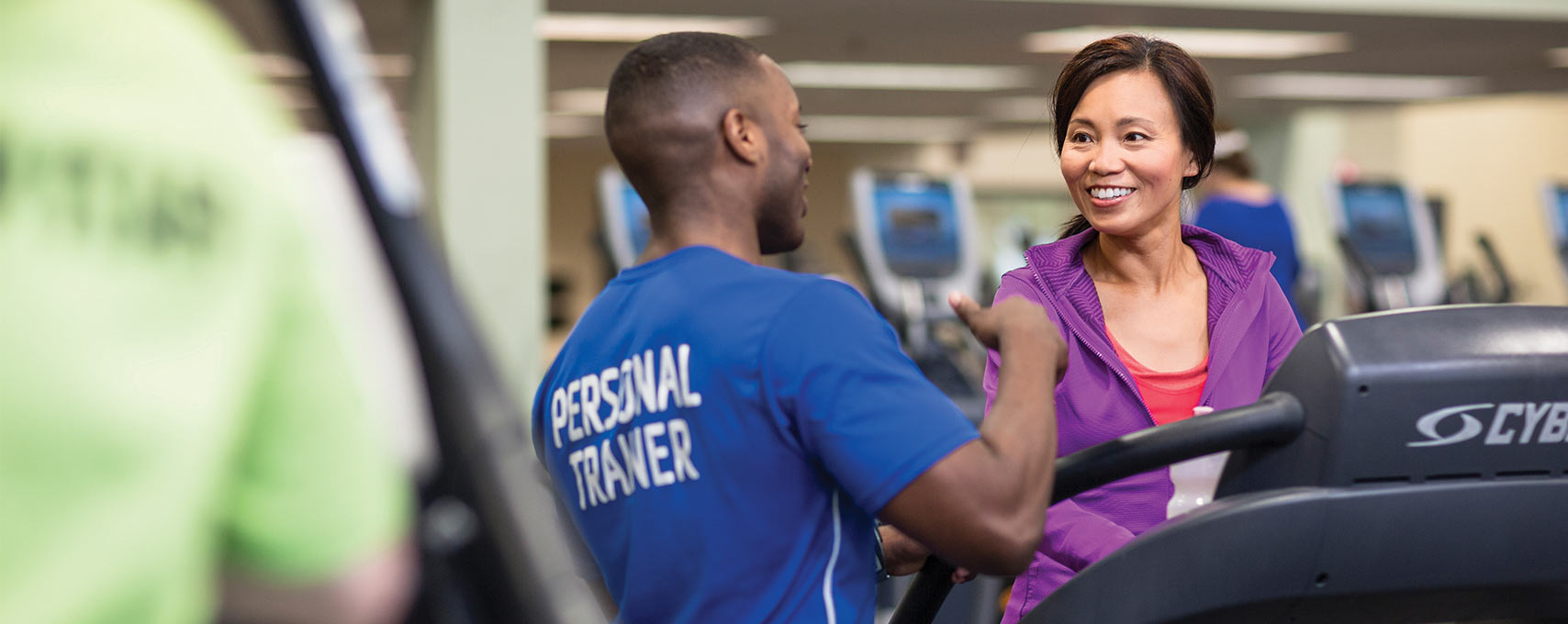 Personal Trainer speaking to Y Member