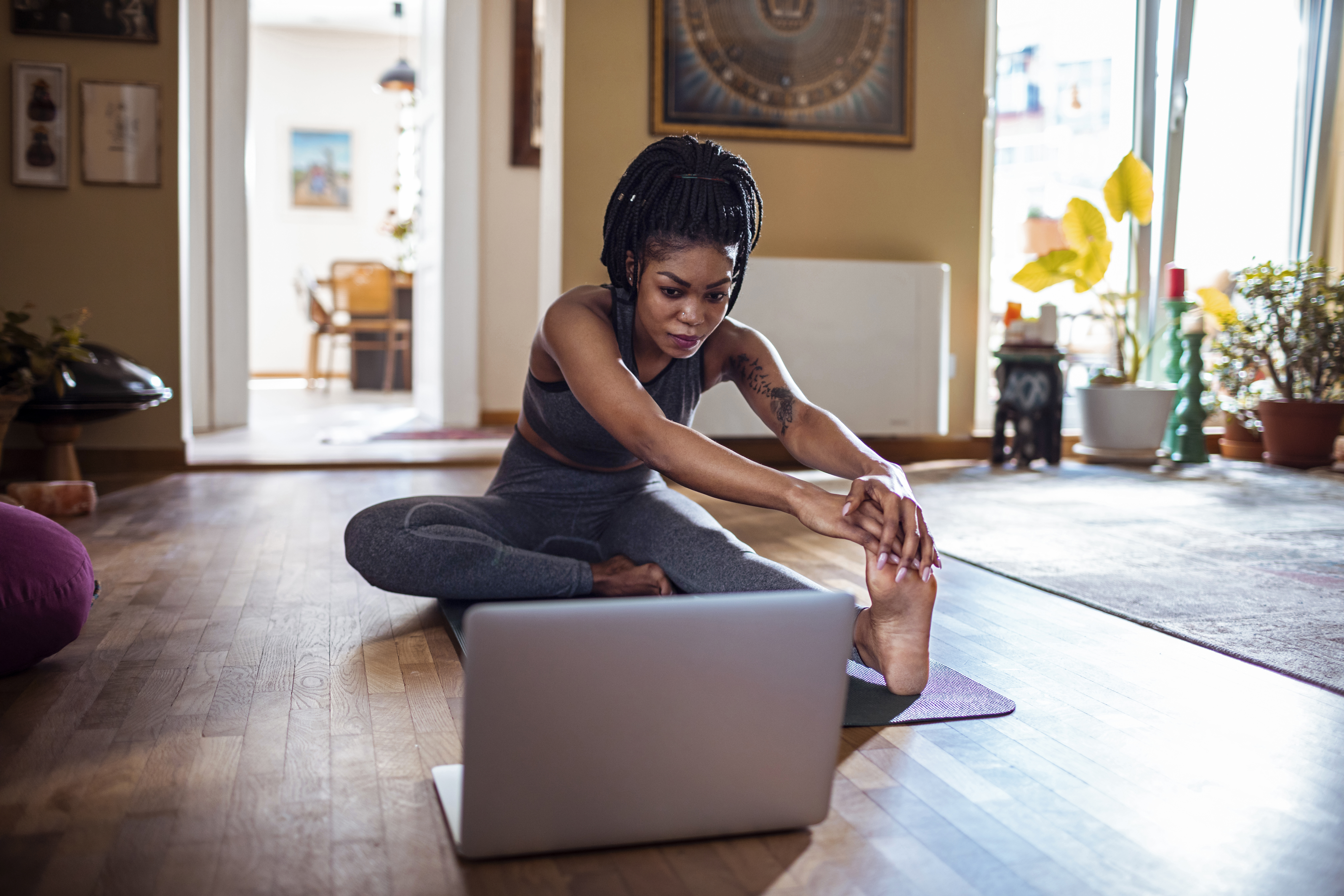 Person stretching with a virtual class